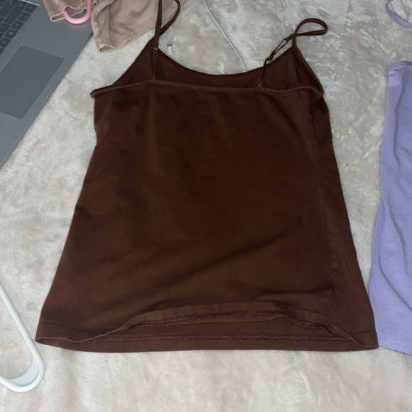 Brown one from gap and a size small. Purple one is time and tru size medium. - Picture 2 of 5
